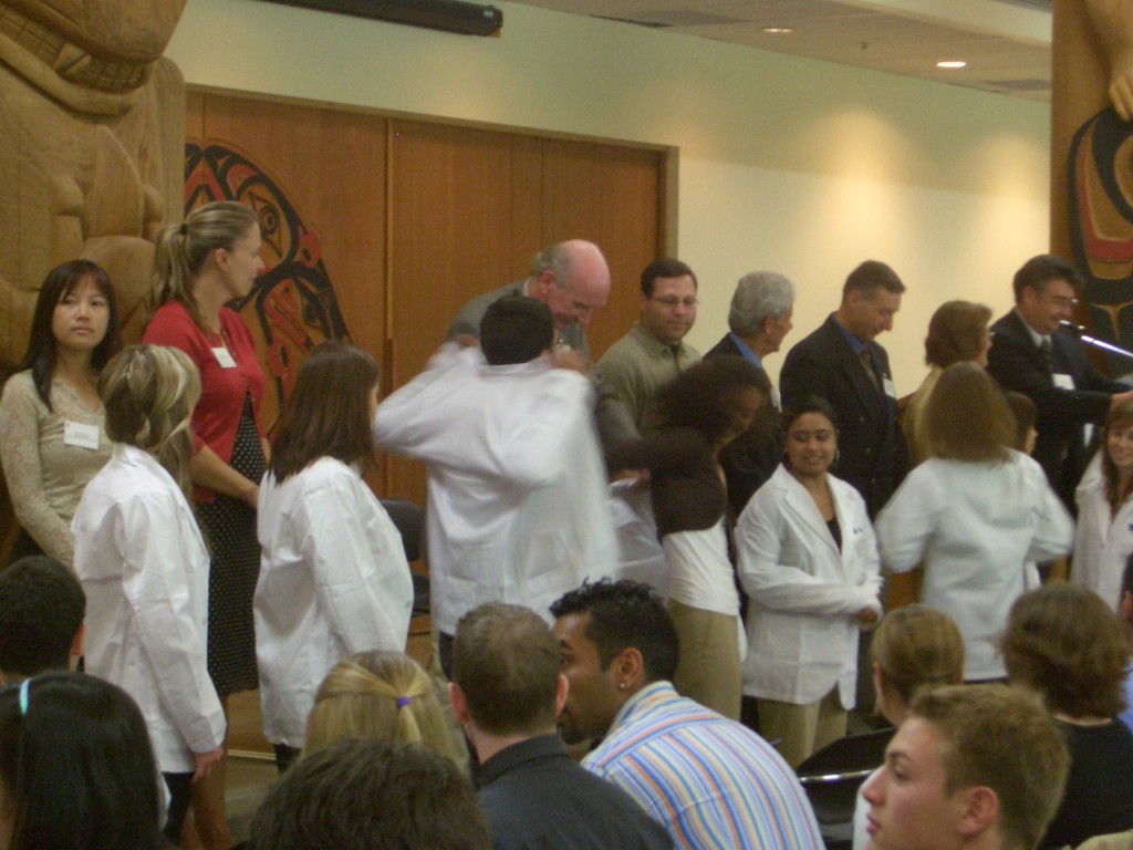 Students receiving white coats at the 2005 White Coat Ceremony.